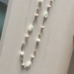 Sterling silver necklace with brown and cream accents